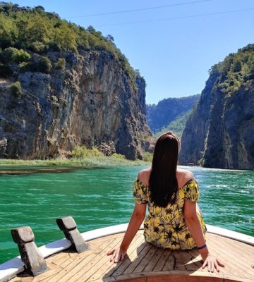 beautiful-girl-deck-boat-while-traveling-sea-with-view-mountains_884748-211