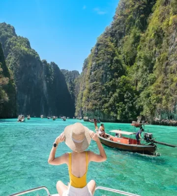 woman-tourist-boat-trip-happy-traveller-relaxing-pileh-lagoon-phi-phi-island-krabi-thailand-exotic-landmark-destination-southeast-asia-travel-vacation-holiday-concept_42256-6819 (1)